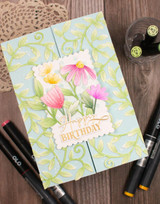 Handmade greeting card with vines on it and happy birthday sentiment on it.