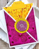 Handmade greeting card with butterflies on it and a flower.