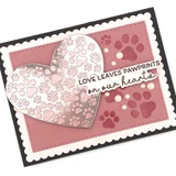 Handmade greeting card with pawprints on it and love leaves pawprints on our hearts sentiment on it.