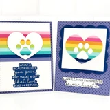 Two handmade greeting cards with paws on each and different sentiments on each.