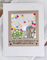 Handmade greeting card with turtle and hedgehog on it and just a little something to brighten your day sentiment on it.