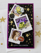 Handmade greeting card with halloween critters on it and happy halloween sentiment on it.