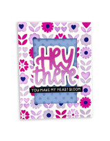Handmade greeting card with flowers on it and hey there, you make my heart bloom sentiment on it.