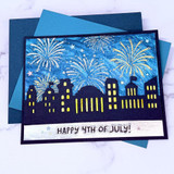 Handmade greeting card with cityscape on it and fireworks with happy 4th of July sentiment on it.