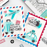 Two handmade greeting cards with travel themes on both and different travel sentiments on each.