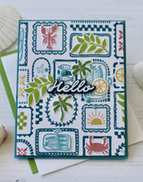 Handmade greeting card with summer beach themed items on it and hello sentiment on it.