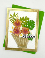 Handmade greeting card with flowers on it and hello sentiment on it.