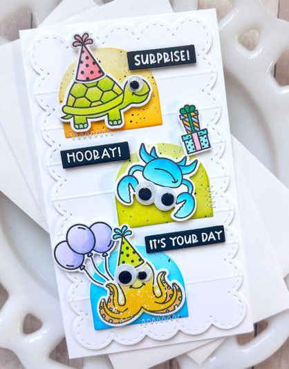 Handmade greeting card with critters on it and various birthday sentiments on it.