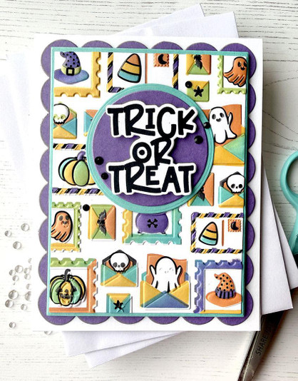 Handmade greeting card with halloween postage on it and trick or treat sentiment on it.