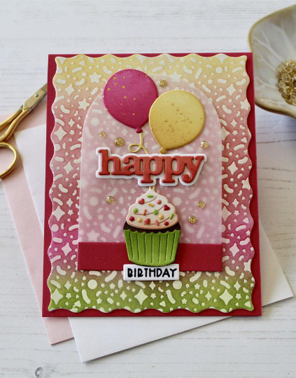 Handmade greeting card with cupcake and balloons on it and happy sentiment on it.