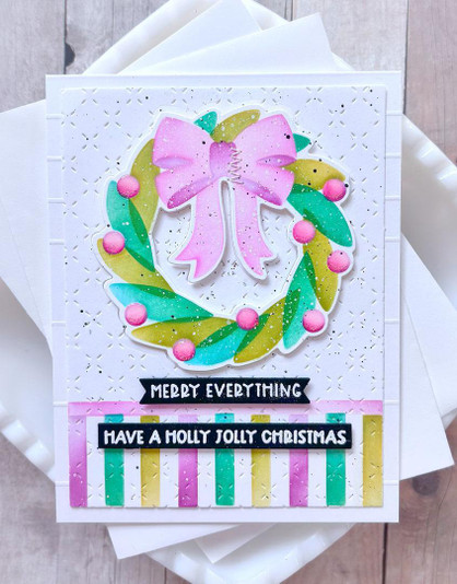 Handmade greeting card with wreath on it and merry everything, have a holly jolly Christmas sentiment on it.