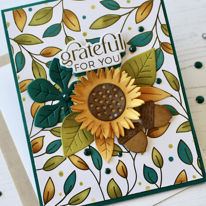 Handmade gratitude card featuring a dimensional sunflower, teal and golden yellow foliage, and a Grateful for You sentiment.