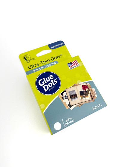 Side image of Glue Dots - Utra-Thin Dot Roll used for layering in papercrafting.