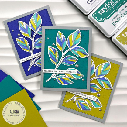 Three handmade greeting cards with flowers on it each of them.