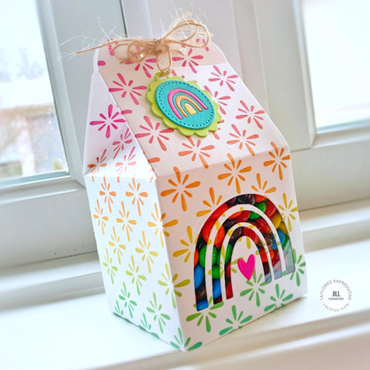 Handmade treat box with a rainbow on it.