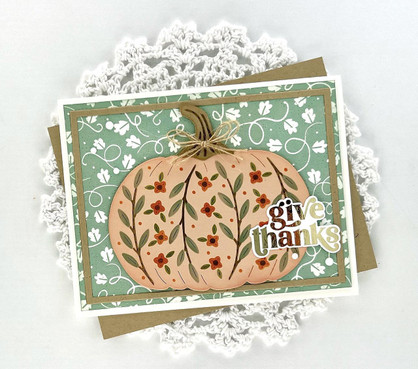 Handmade greeting card with a pumpkin on it with give thanks sentiment on it.