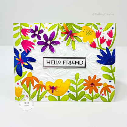 Handmade greeting card with flowers on it and hello friend sentiment on it.