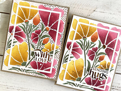 Two handmade greeting cards with flowers on it with one saying with love sentiment on it and one with sending hugs sentiment on it.