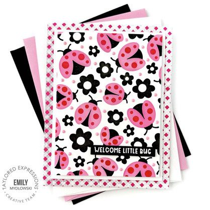 Handmade greeting card with lady bugs and flowers on it with welcome little bug sentiment on it.