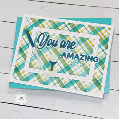 Greeting card with you are amazing sentiment, golf club, tee, and golf ball.