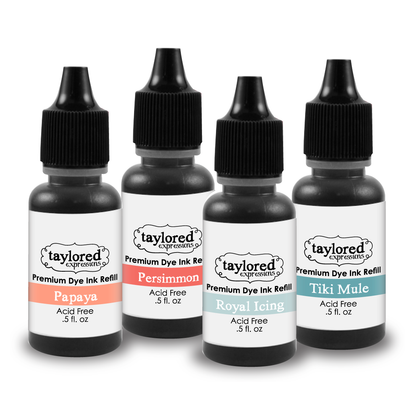 Graphic of four ink refill bottles with new colors from Taylored Expressions including Papaya, Persimmon, Royal Icing and Tiki Mule.
