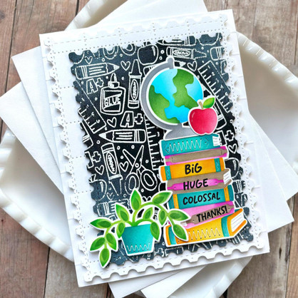 Handmade teacher themed greeting card with books on it and globe on it.