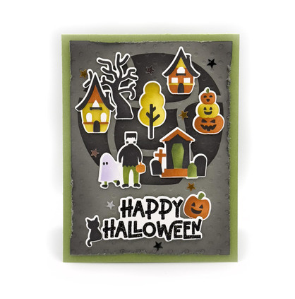 Handmade greeting card with haunted houses on it, monsters, pumpkins, a cat and happy halloween sentiment on it.