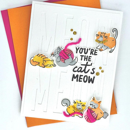 Handmade greeting card with cats on it playing with toys and you're the cat's meow sentiment on it.