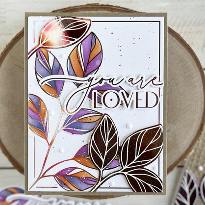 Handmade greeting card with flowers on it and you are loved sentiment on it.