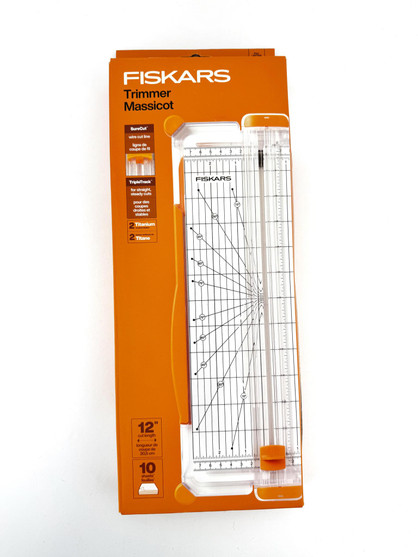 Image of Fiskar's SureCut Paper Trimmer in box.