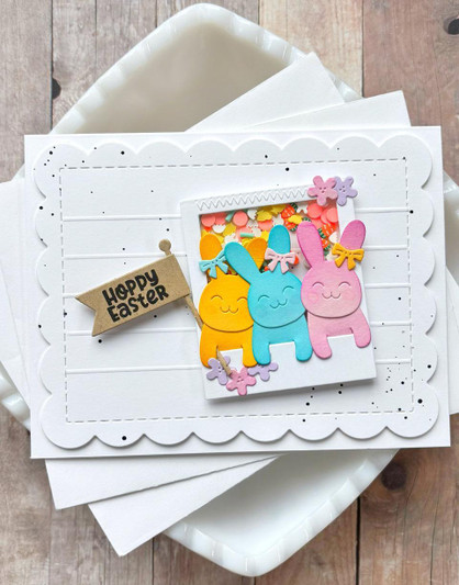 Handmade greeting card with three bunnies on it and hoppy easter sentiment on it.