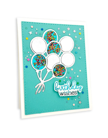 Handmade greeting card with balloons on it and birthday wishes sentiment on it.
