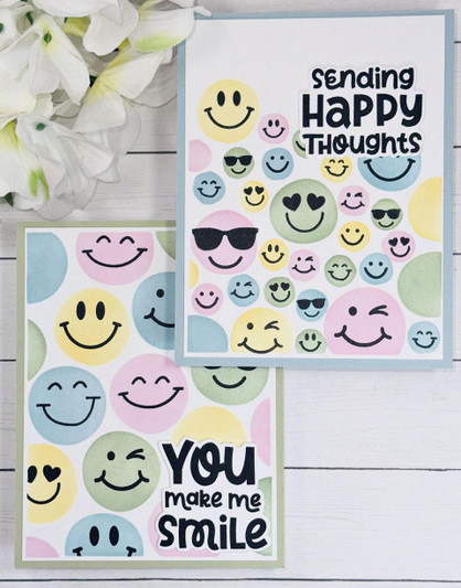 Two handmade greeting cards with smiley faces on each and different uplifting sentiments on each.