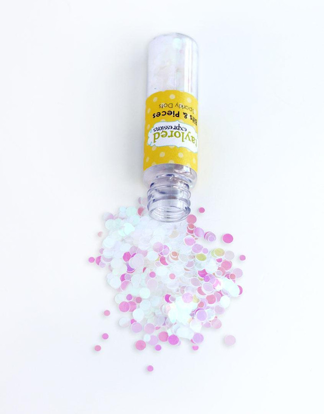 Image of Bits & Pieces - Sparkly Dots falling out of the tube they're in.