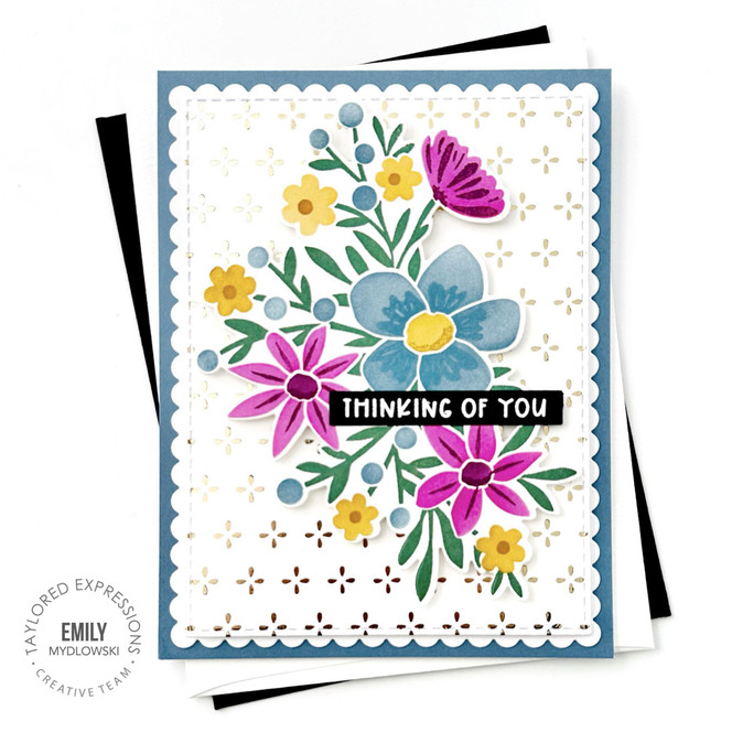 Handmade greeting card with flowers on it and thinking of you sentiment on it.