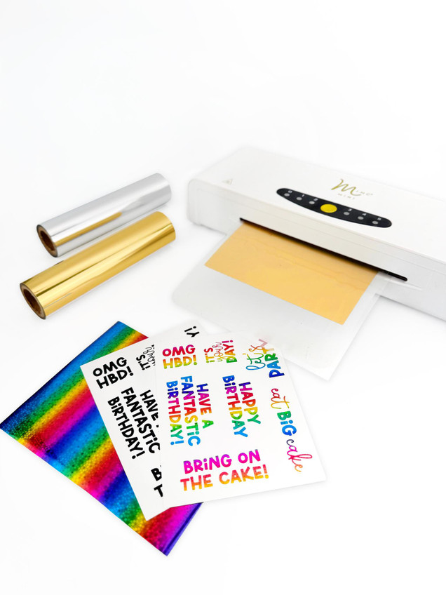 Image of the Mini Minc Foil Applicator with items being foiled.