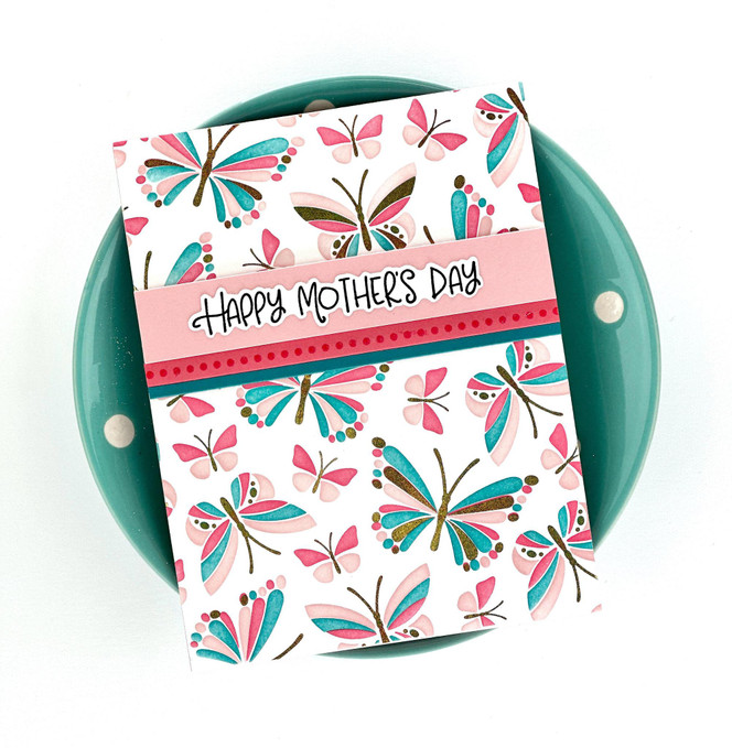 Handmade greeting card with butterflies on it and happy mother's day sentiment on it.