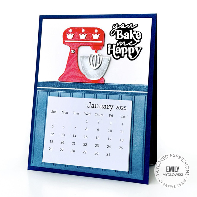 Handmade calendar with a mixer for baking on it and you bake me happy sentiment on it.