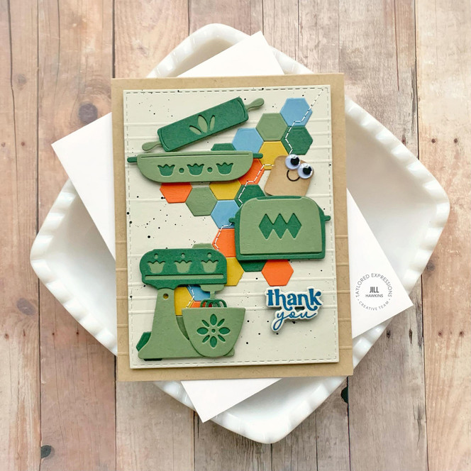 Handmade greeting card with baking machinery on it and thank you sentiment on it.