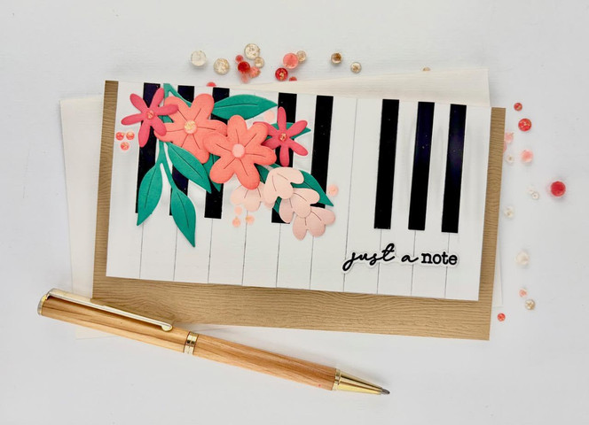 Handmade greeting card with piano keys on it and just a note sentiment on it.