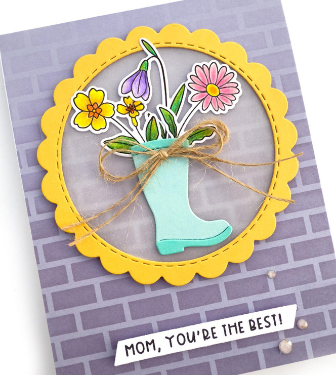 Handmade greeting card with a rain boot on it with flowers in it and mom, you're the best sentiment on it.