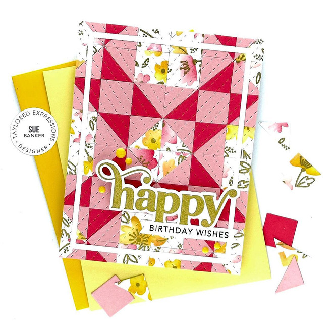 Handmade greeting card with patterned squares on it and happy birthday wishes sentiments on it with cardstock in background.