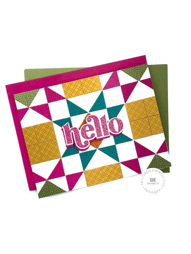 Handmade greeting card with patterned squares on it and hello sentiment on it with cardstock in background.