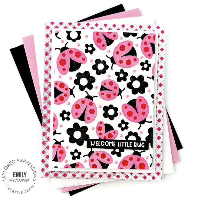 Handmade greeting card with lady bugs and flowers on it with welcome little bug sentiment on it.