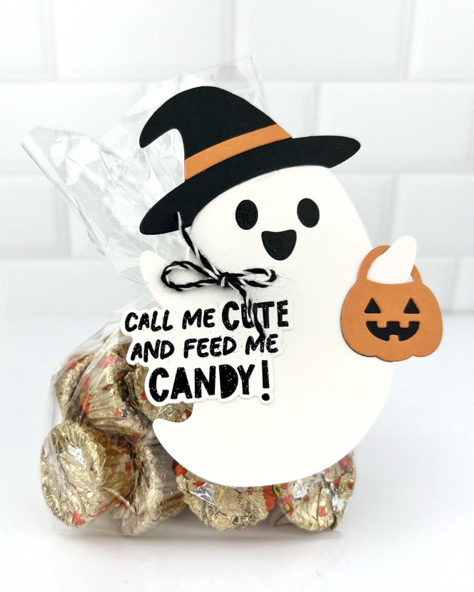 Handmade greeting tag for gift bag with a ghost on it and call me cute and feed me candy sentiment on it.