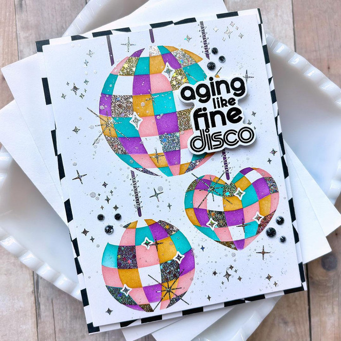 Handmade greeting card with disco balls on it and aging like fine disco sentiment on it.