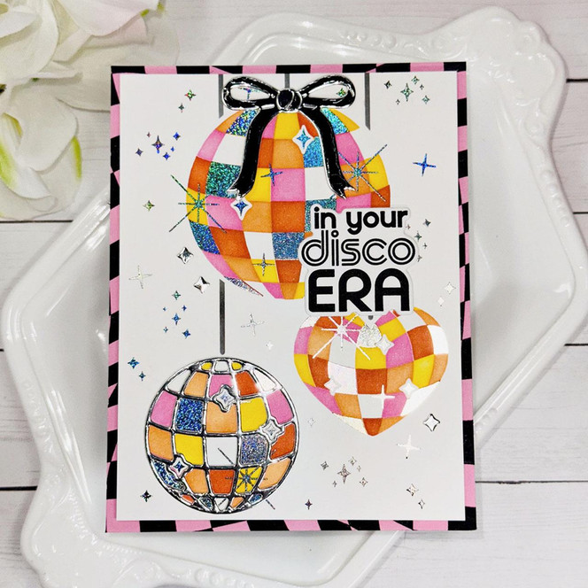 Handmade greeting card with disco balls on it with one having a bow on it with in your disco era sentiment on it.
