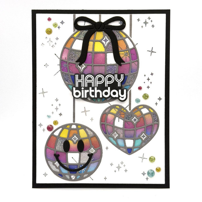 Handmade greeting card with disco balls on it with one having a bow on it with happy birthday sentiment on it.