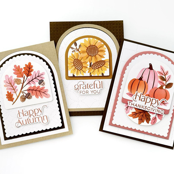 Three handmade greeting cards with falls leaves and pumpkins on them with fall sentiments on each.