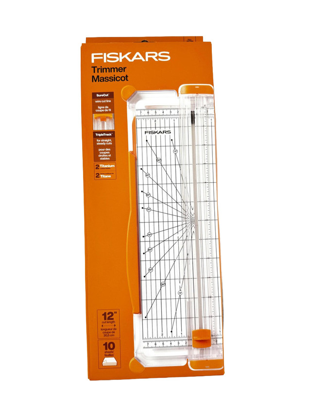 Image of Fiskar's SureCut Paper Trimmer in box.